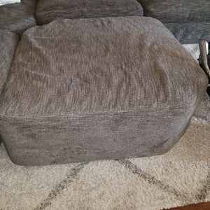 Grey fabric ottoman